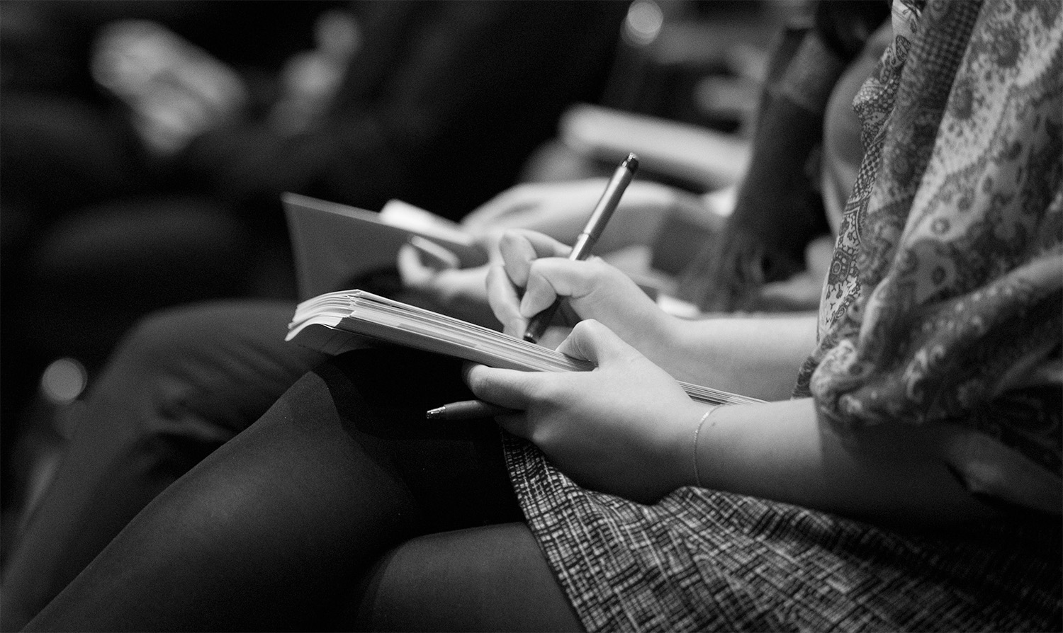 Woman taking notes